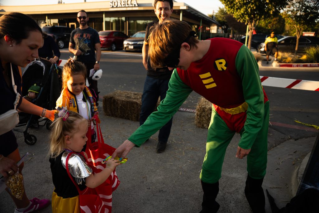 East Dallas Chamber of Commerce - Robin passing out candy to kids